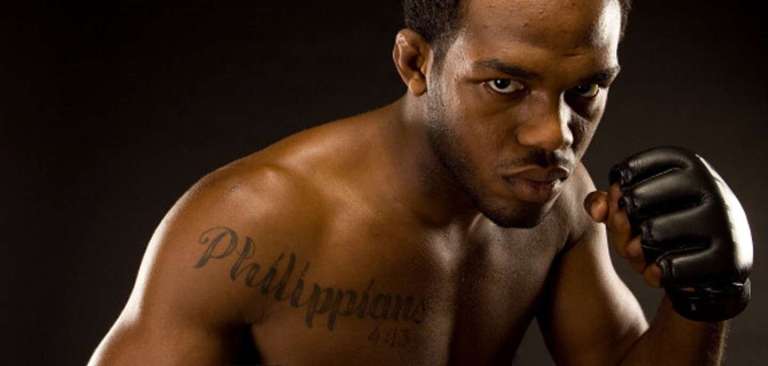 19-phillipians4 boxer with Phillipians 4:13 tattoo on his chest