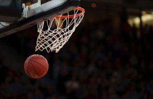 Basketball going through the hoop after a make