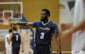 Athlete pointing across a basketball court