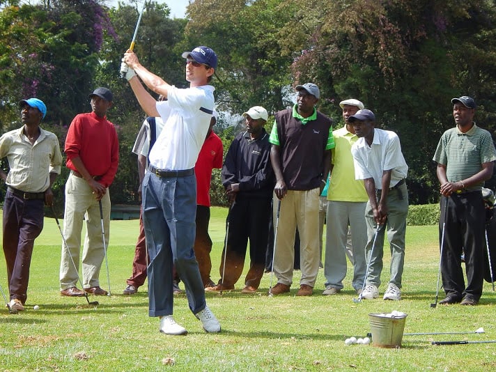 Golf-Kenya_trip-Seth_Reeves_and_caddy_clinic_at_Windsor_golf_club
