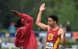 Track Athletes High-Five