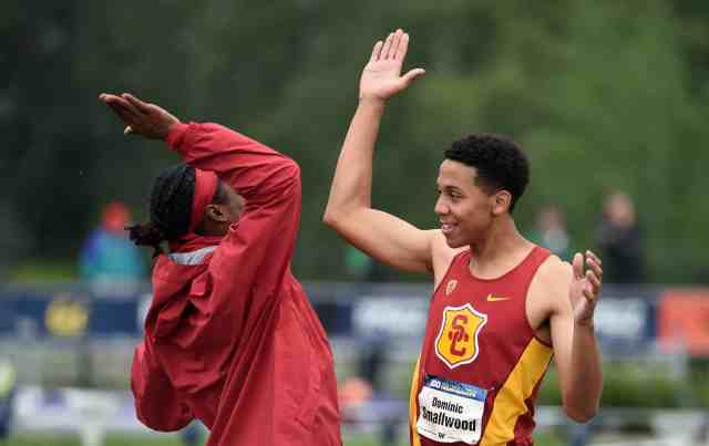 Track Athletes High-Five