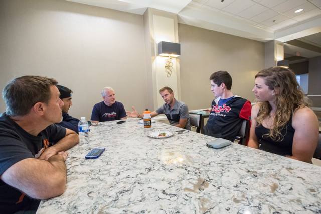 group of people meeting around a table