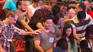 Staff Members Praying