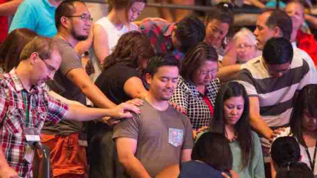 Staff Members Praying