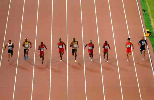 Track sprinters in the midst of a race