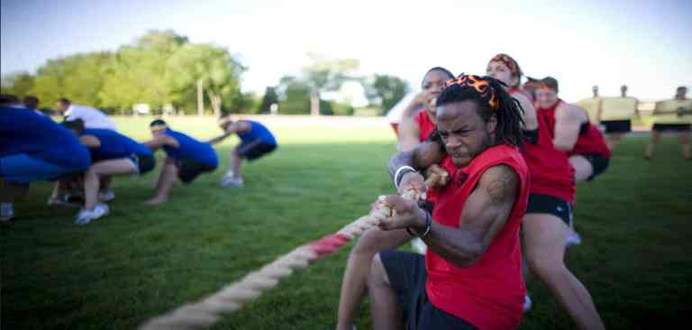 athletes playing tug of war