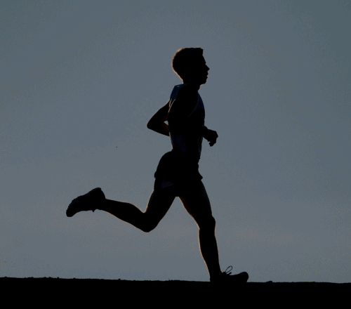 black and white silhouette of a man running