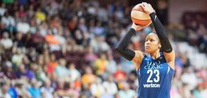 Maya Moore shooting a basketball