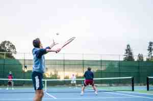 Men playing tennis
