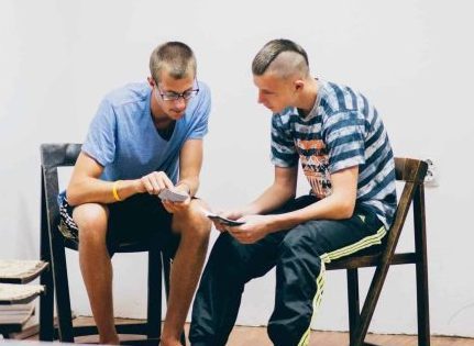 two young men sharing faith