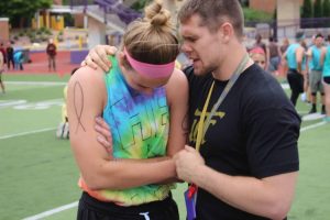 Intern Praying with Athlete