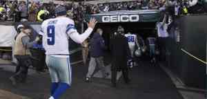 American football players leaving the field