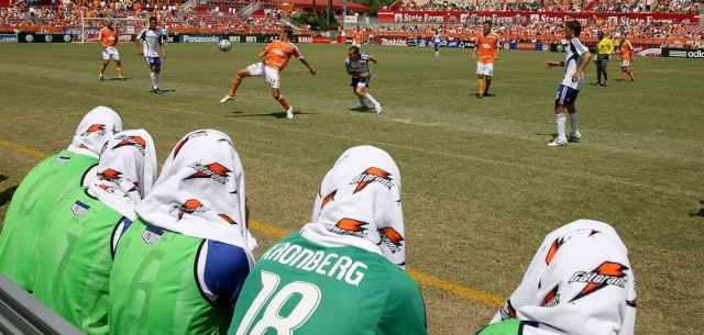 athletes watching from the sidelines