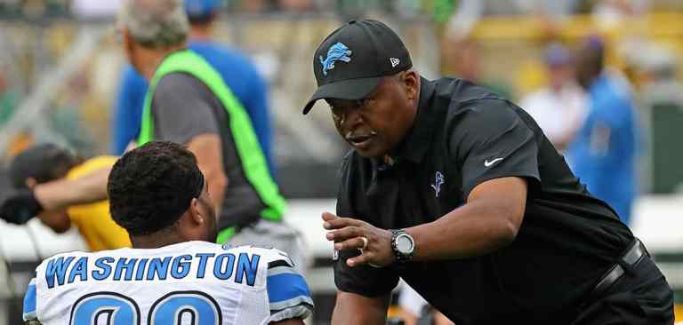 coach with american football player