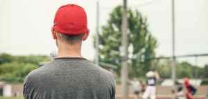 man wearing a red hat