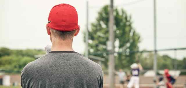 man wearing a red hat