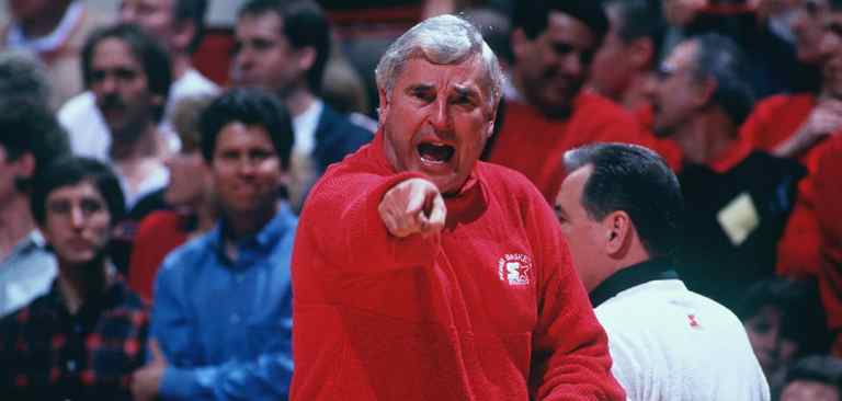 red-faced, pointing, yelling coach