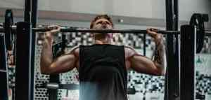 man lifting weights