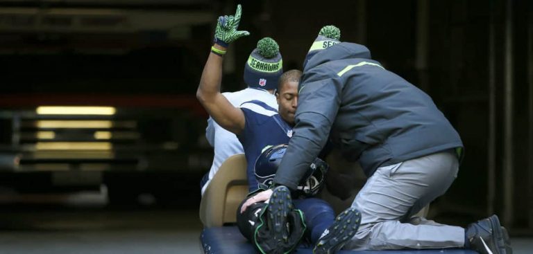 athlete being carried off the field