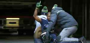 athlete being carried off the field