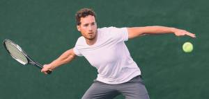 male athlete playing tennis