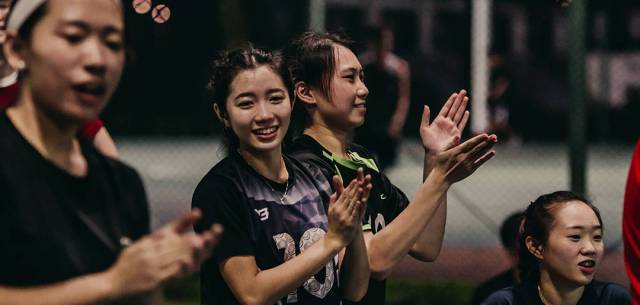 female athletes clapping