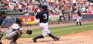 baseball player swinging