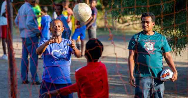 news_volunteer_chaplains people practicing soccer