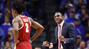 Basketball coach Avery Johnson with player