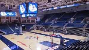 In this photo taken Friday, Oct. 27, 2017, a new jumbo scoreboard at center court and new scoreboards on the walls of the McCarthey Athletic Center in Spokane are part of the improvements in the Gonzaga basketball program after the Bulldogs men's team reached the NCAA title game last season. Both inside and outside "The Kennel," Gonzaga is undergoing an upgrade, including a new locker room, new practice facility, new fancy center-hung scoreboard in the arena--all the accompaniments of being a major college basketball program. (AP Photo/Nicholas K. Geranios)