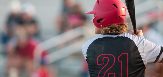 softball player at bat