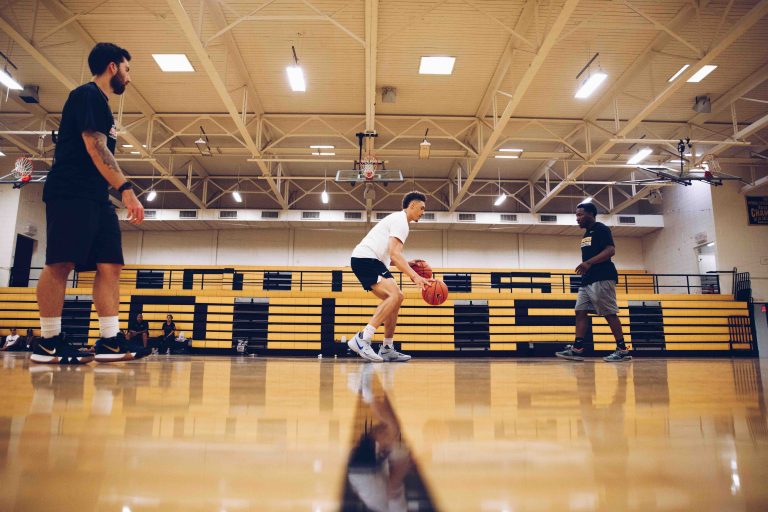 athletes playing basketball