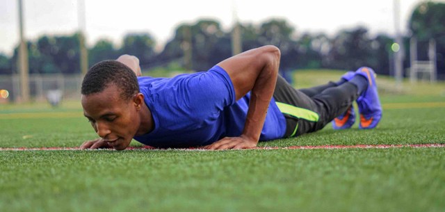 athlete doing pushups