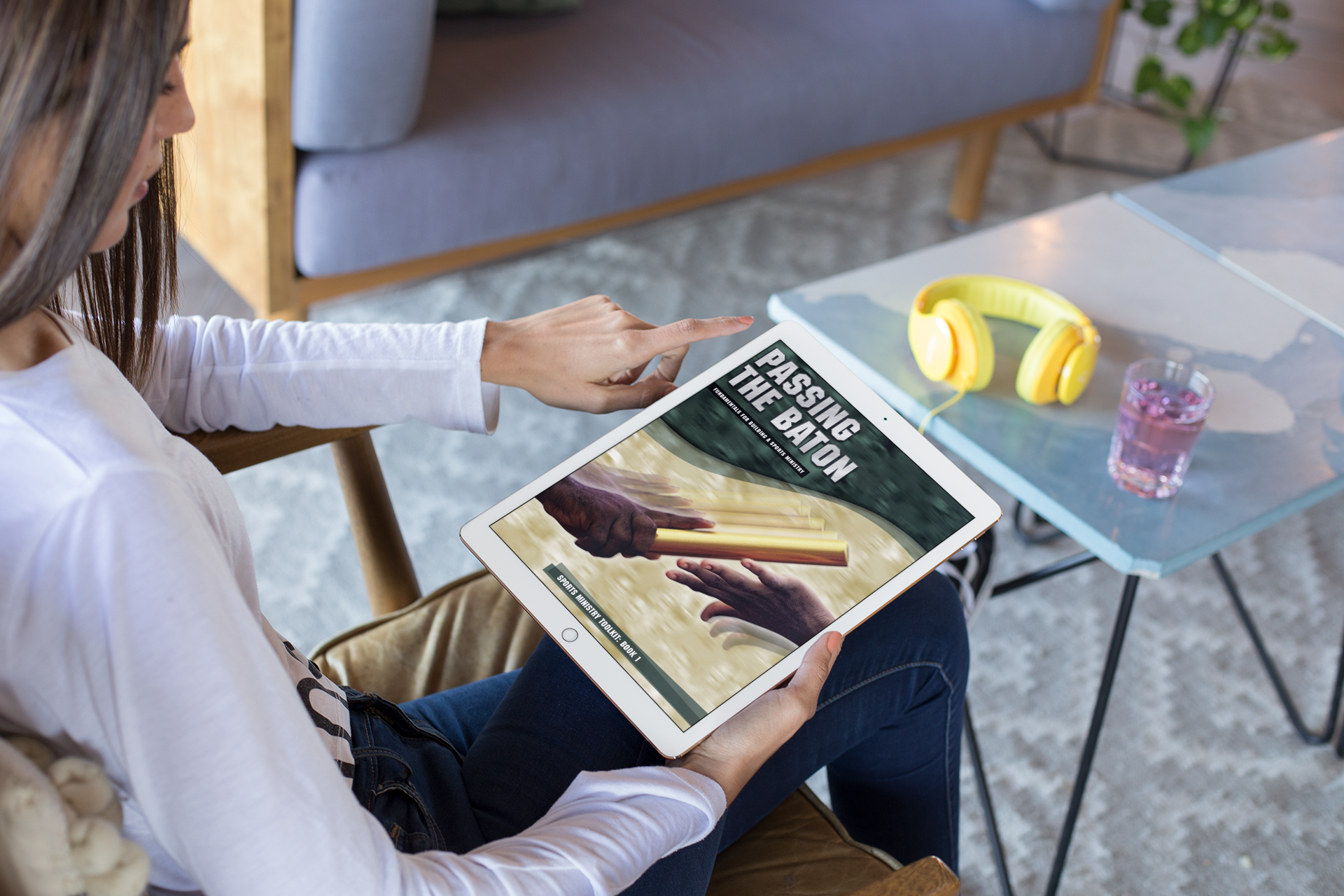 The Passing the Baton sports ministry guide shown on a tablet