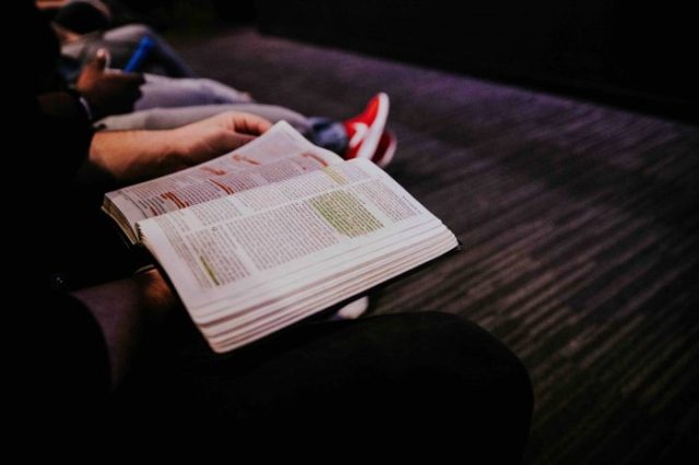 person reading Bible
