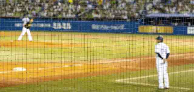 view of baseball players from the stands
