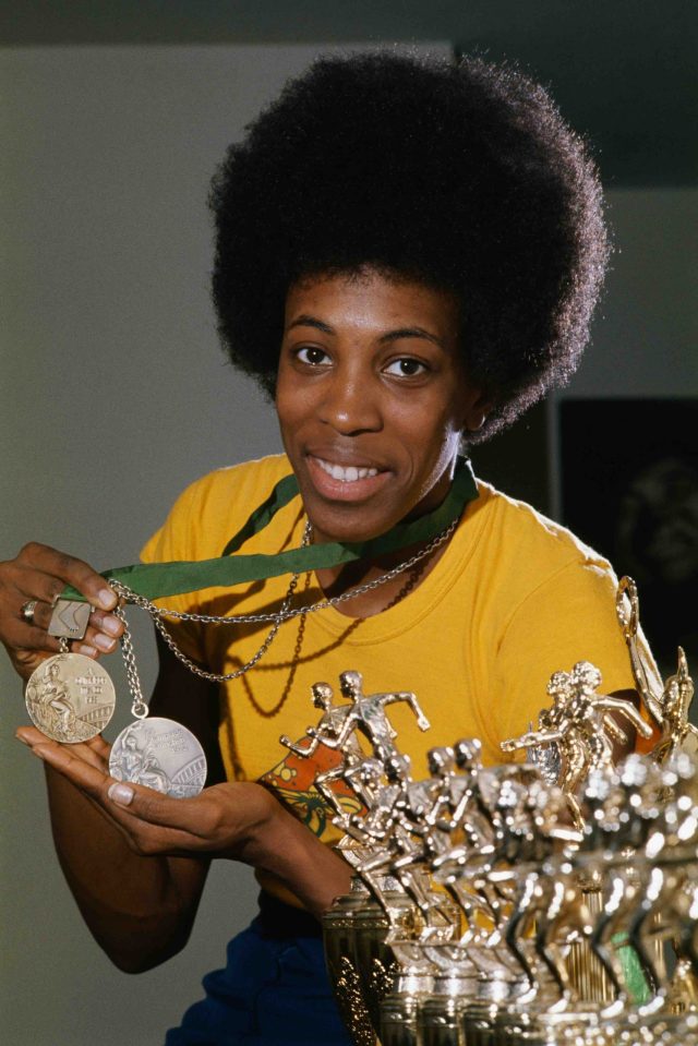 Madeline Manning Mims holds her Olympic gold medal from the '68 games in Mexico, and Olympic silver medal from the '72 games in Munich for the 800 meters