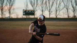 baseball player swinging bat