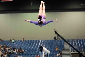 female gymnist flipping
