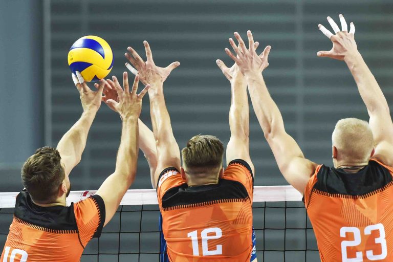 Triple block in men volleyball