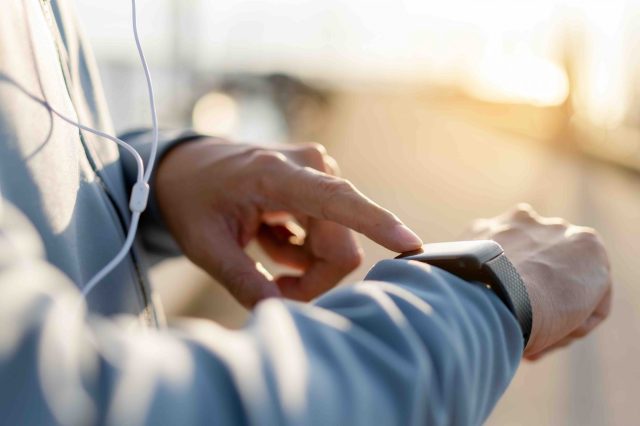 Athlete using smart watch