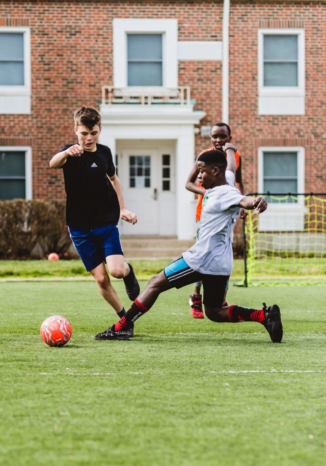 youth playing soccer
