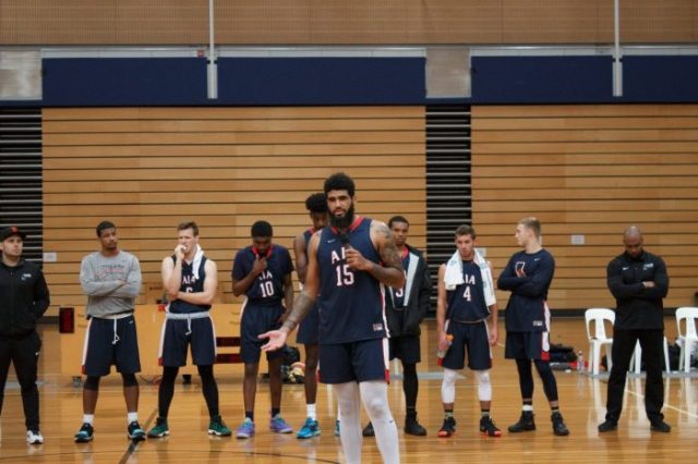 Basketball player speaking at halftime