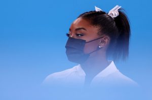 Profile picture of Simone Biles in front of powder blue background