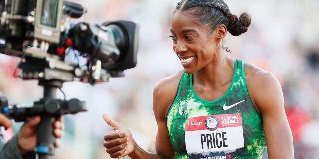 Female track athlete in front of a camera
