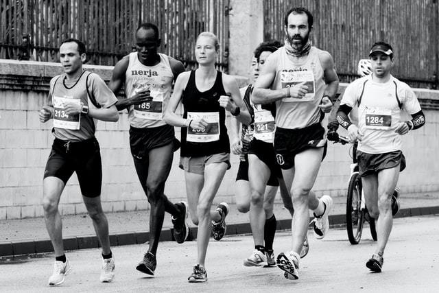 men and women in a race