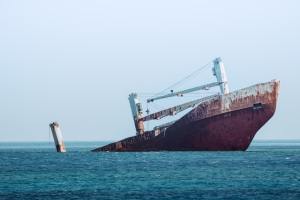 Ship half sunk in the water