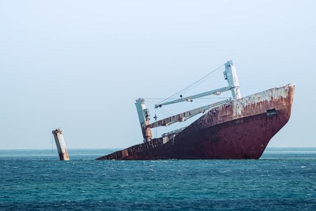 Ship half sunk in the water