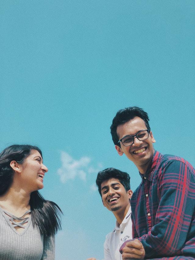 Three people laughing